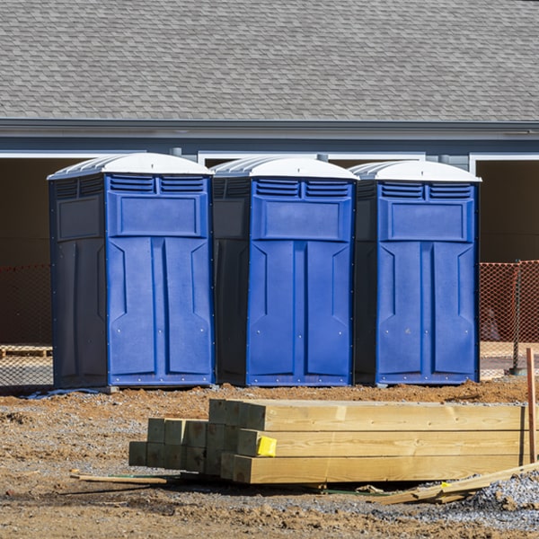 what is the cost difference between standard and deluxe portable restroom rentals in Ripon